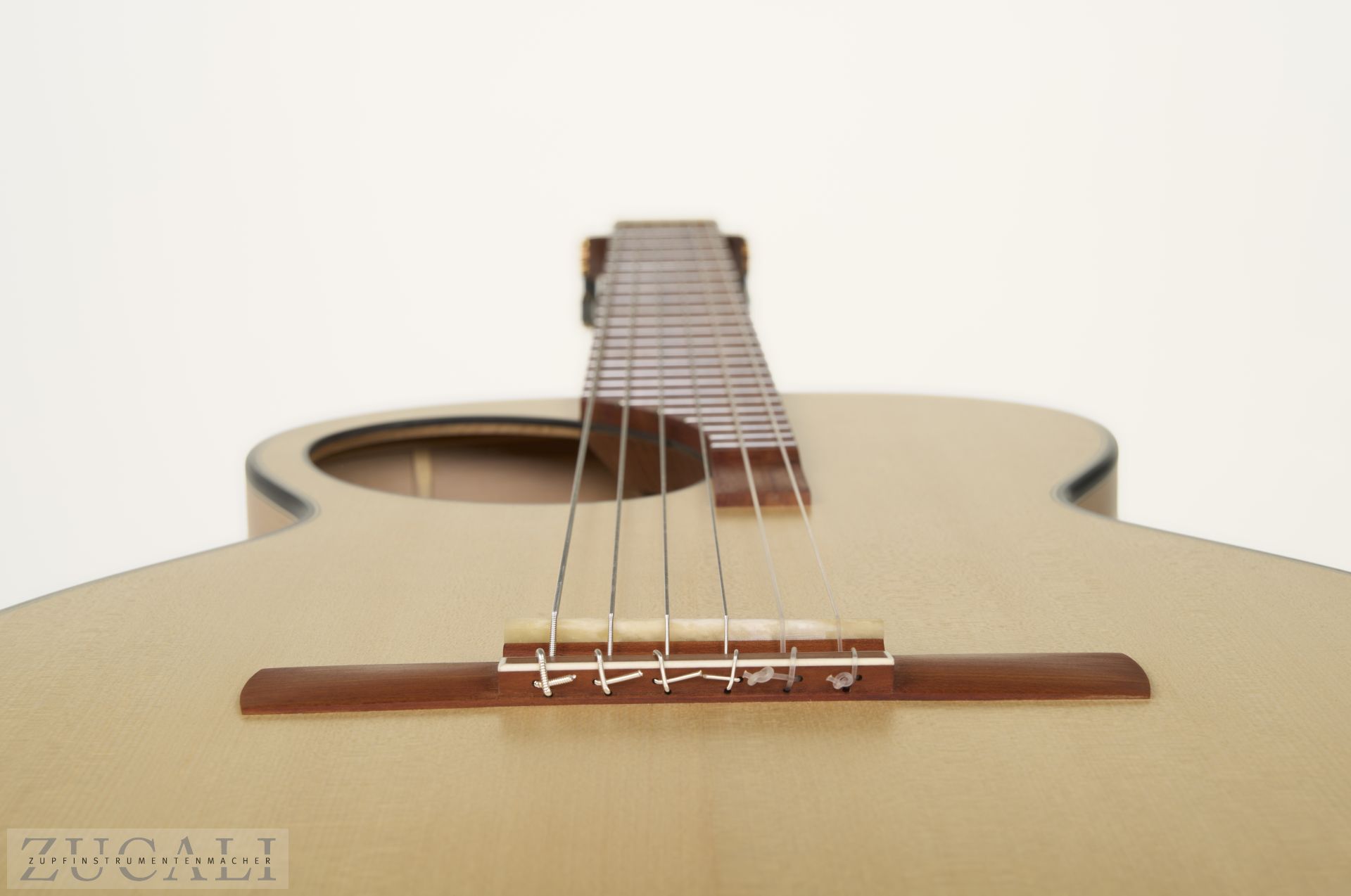 Bridge and string attachment